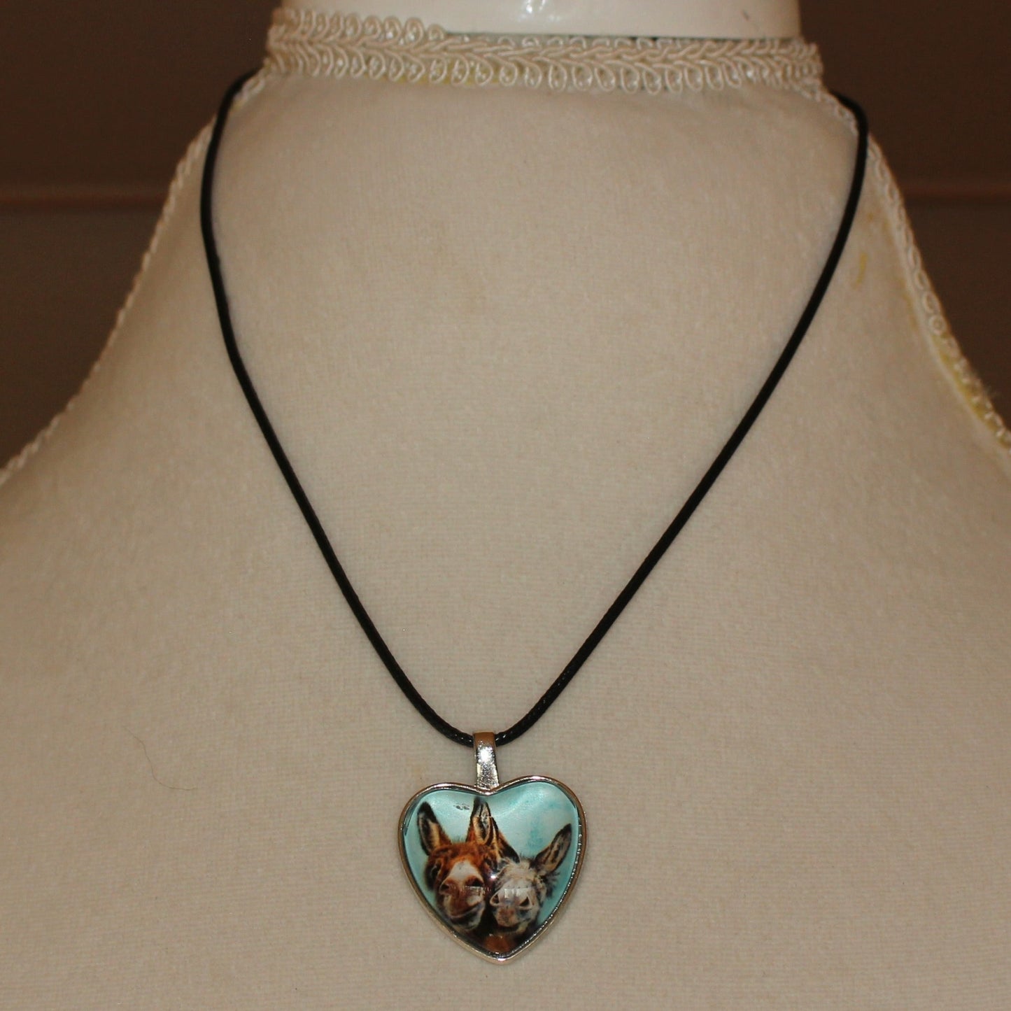 Two Mule Head Heart Necklace